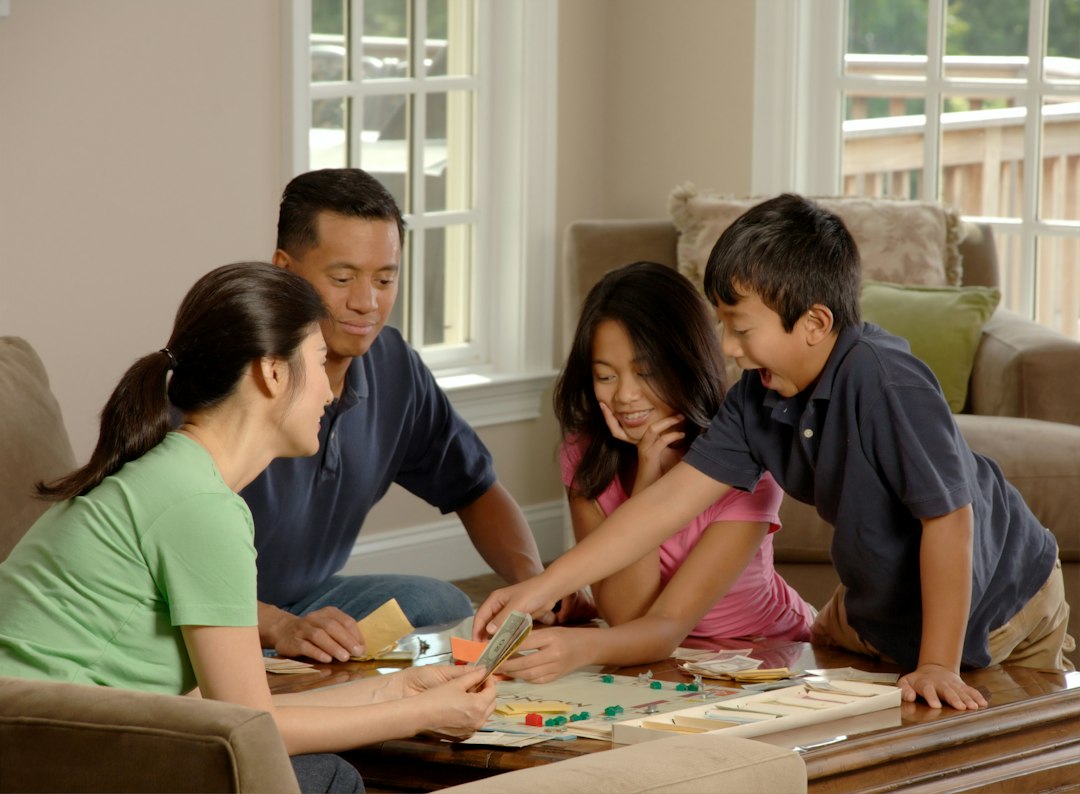 A family gathered around a coffee table at home